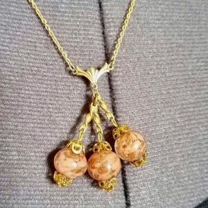 Vintage glass bead necklace…peach and gold… unusual!